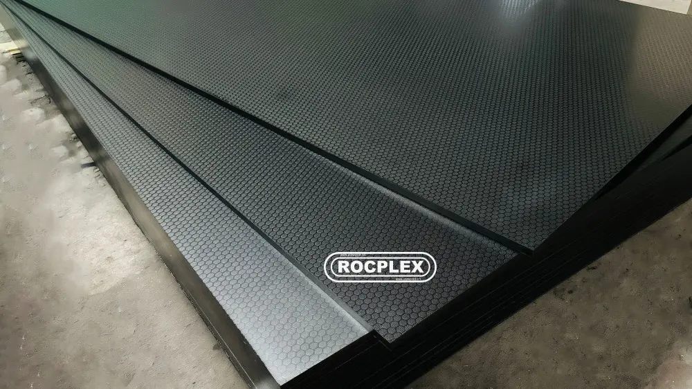 Anti-Slip Plywood sheets stacked in factory warehouse – ROCPLEX hexagrip film faced panels