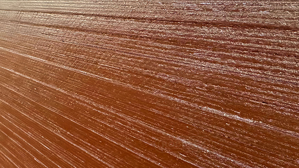 Phenolic resin surface close-up for water-resistant plywood protection