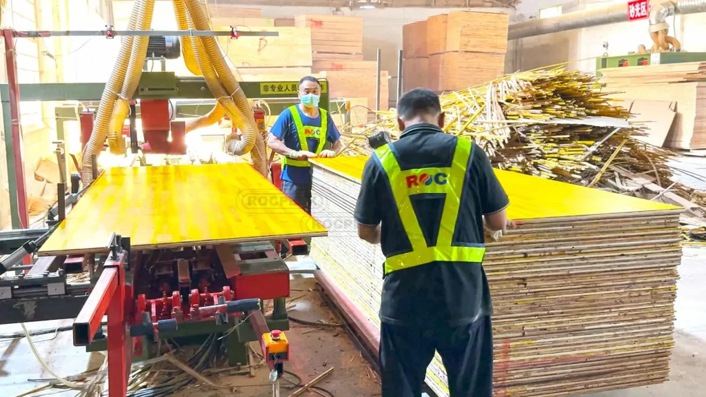 Workers manufacturing ROCPLEX 3-ply formwork panels in a factory